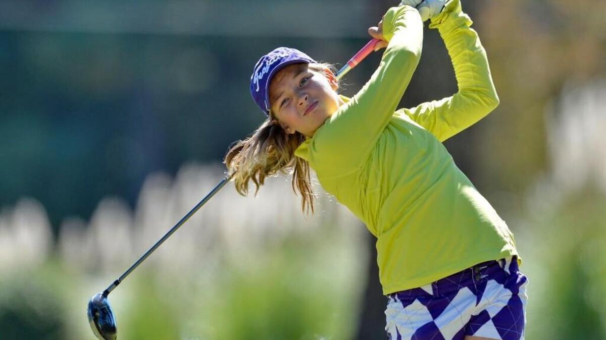 Buggy Reinke, a student at Northwestern High School in Rock Hill, tees off during the AAAA Upper State golf tournament Oct. 19 in Simpsonville. Buggy who has only been playing golf for less than a year, plays in honor of her father Staff Sgt. Gavin B. Reinke who died in Iraq May 4, 2006.