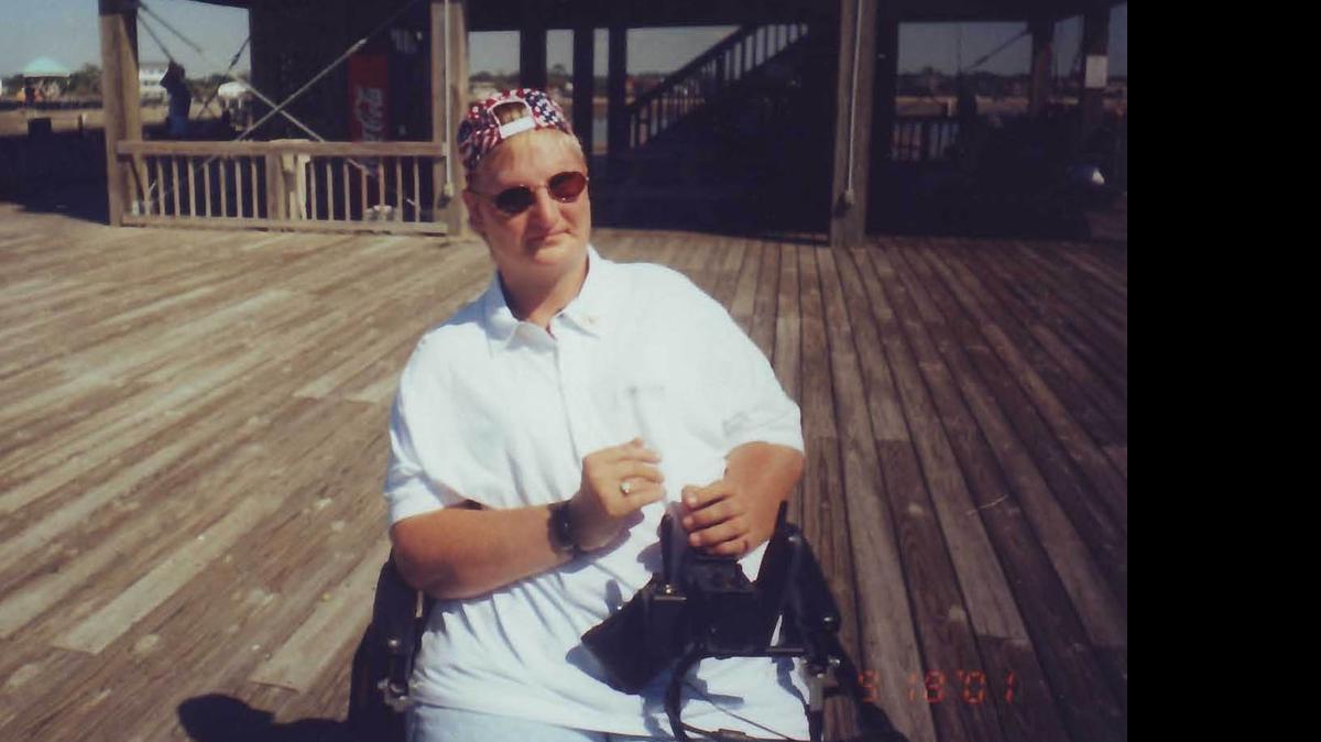 
Rose Thrift at the beach. Thrift, 49, died June 8 from a rare bone disease.
