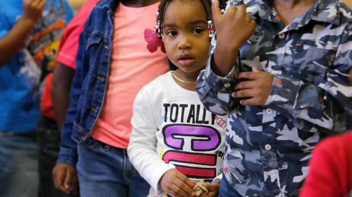 
Graceland Thomas, 3, waits in line to go back to class after lunch Tuesday at Head Start in Rock Hill. 
