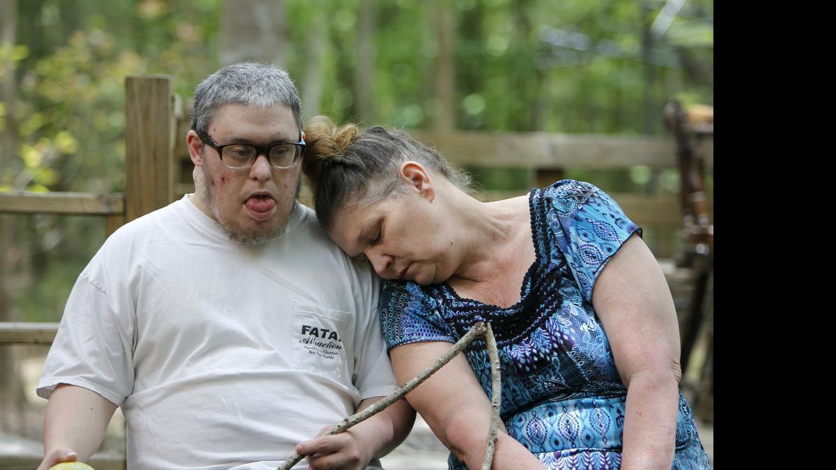 
Dyanne Stewart with her disabled son Ronnie Dean Stewart Jr. at their Clover home.
