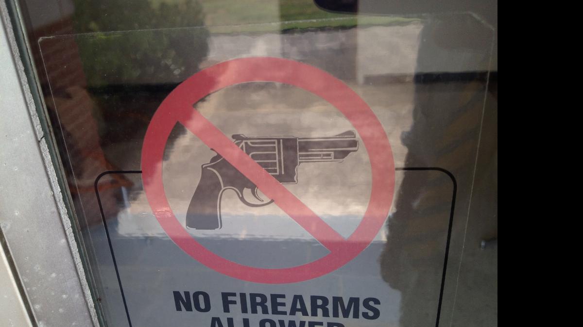 
A sign on the public access doors at the York County office building where Anna Moore worked as an assistant county manager. Investigators say Moore’s husband, Randy Eugene Moore, shot her, her son and her son’s girlfriend – and then himself – on Sunday.
