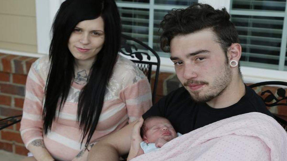 
Morgan Varn and Michael Saunders Jr. with their daughter, Nala Varn on Monday.
