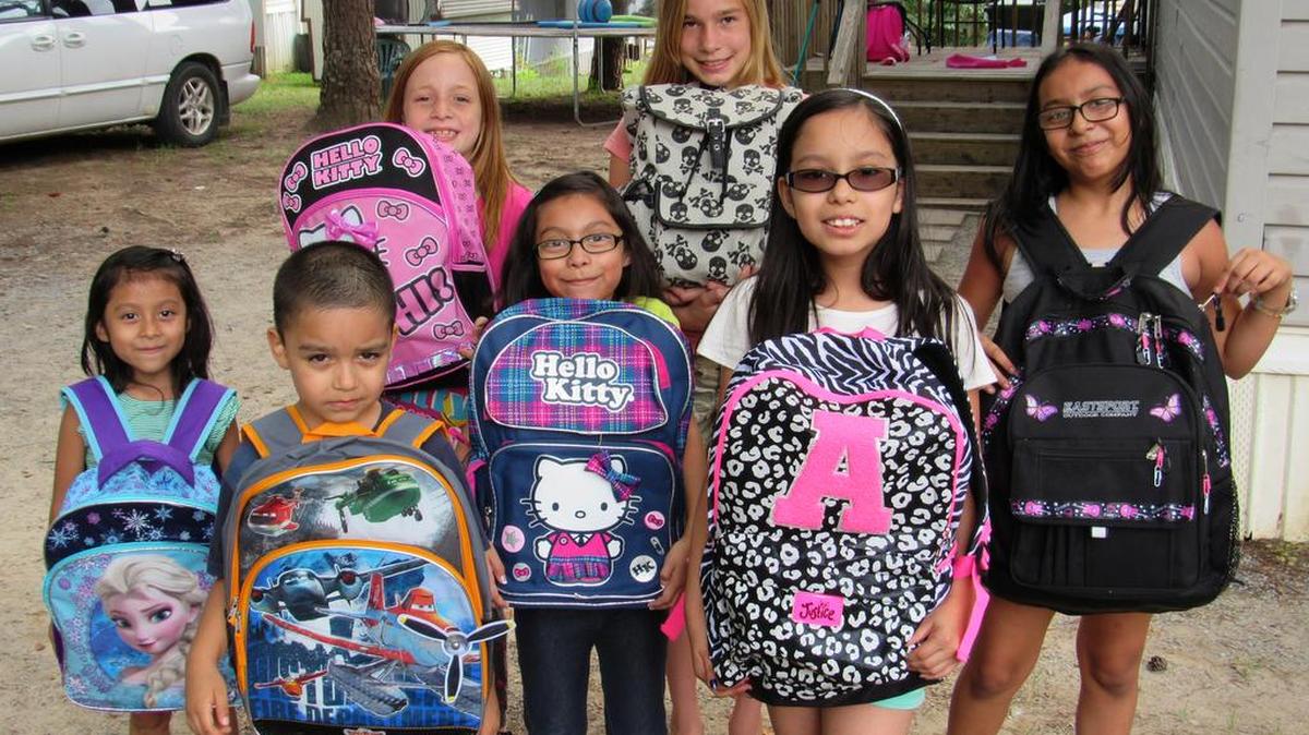 
Kids in York show off their bookbags for school that starts Wednesday. Left to right back row, Jayden Bennett, Kayla Bennett. Left to right front row, Emelyn Pacheco, Omar Rodriguez, Shaelin Pacheco, Andrea Rodriguez, Naomi Pacheco.
