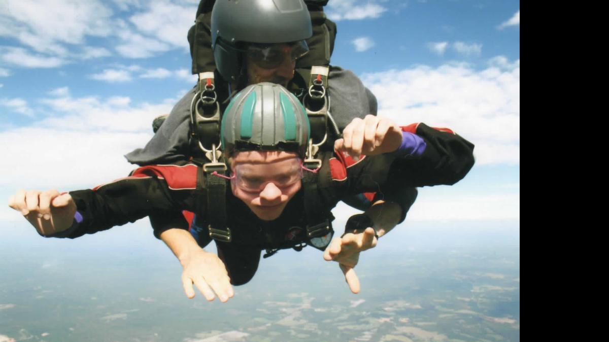 
Ryan Noblett, a blind student graduating Saturday from Northwestern High School, skydiving.
