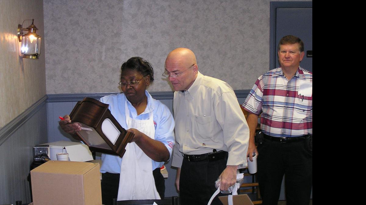 
Johnnie Mae Agurs, with Shrimp Boat owner Chris Cramer, at her retirement party two years ago.
