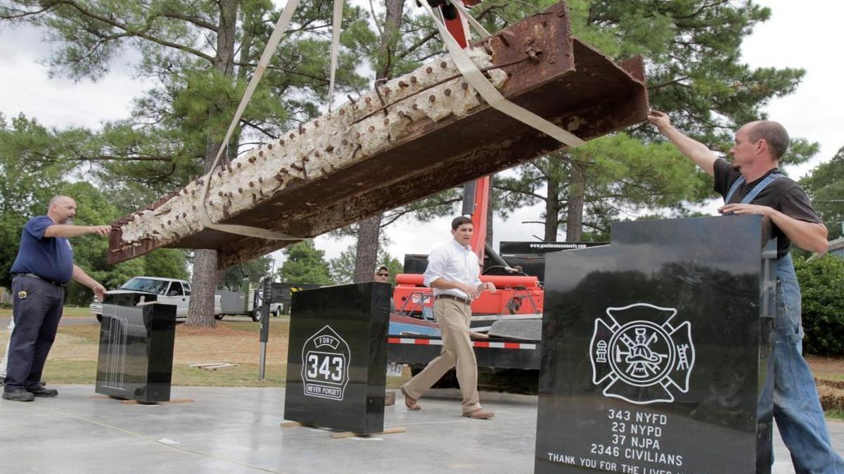 
The World Trade Center steel beam is lowered into position at the York County Fire Training Center during the installation of the 9/11 monument in 2011.
