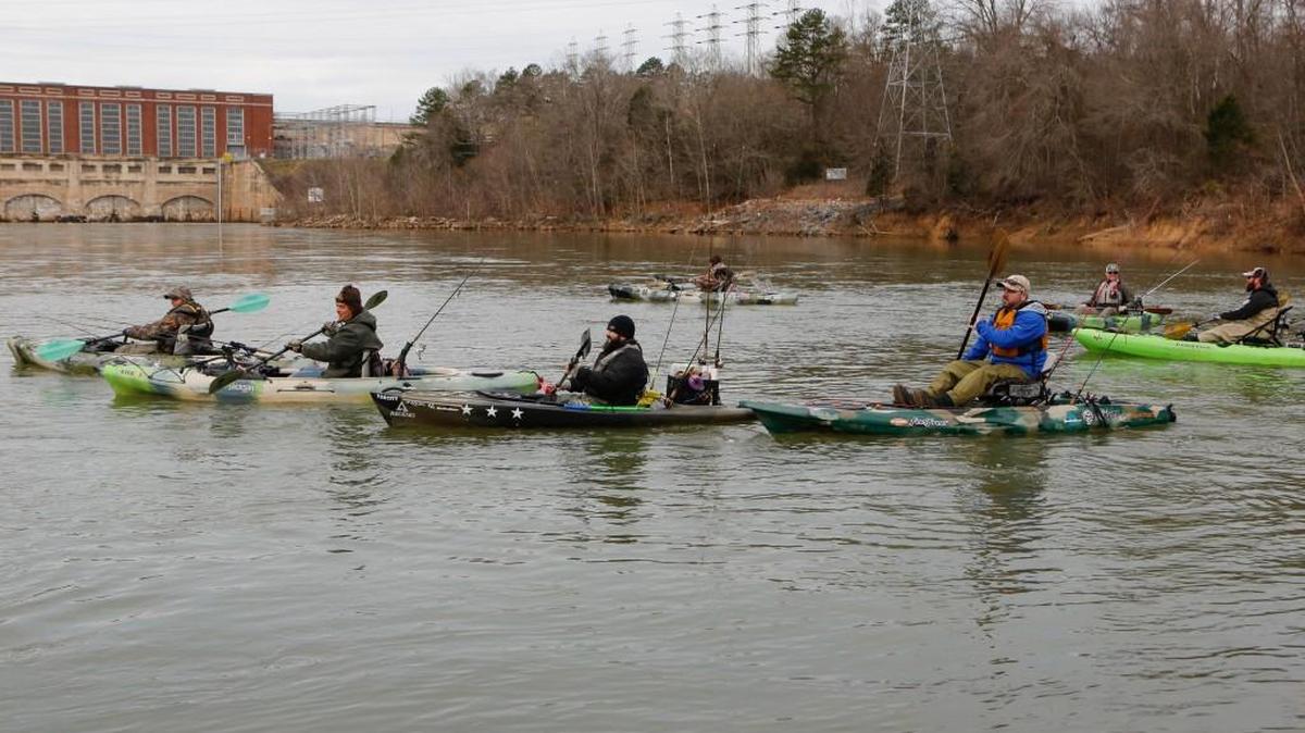 Kayakers braved the early-morning chill Sunday for a outing to remember fellow fisherman Mike “Catawba” Byrne on the Catawba River below the Lake Wylie Dam.