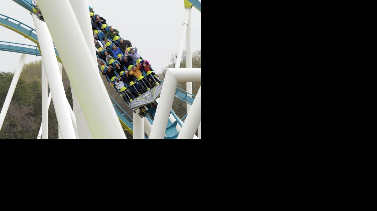 
Roller coaster riders enjoy their experience on Carowinds' new Fury 325, the world tallest and fastest giga coaster, during media day on Wednesday. 

