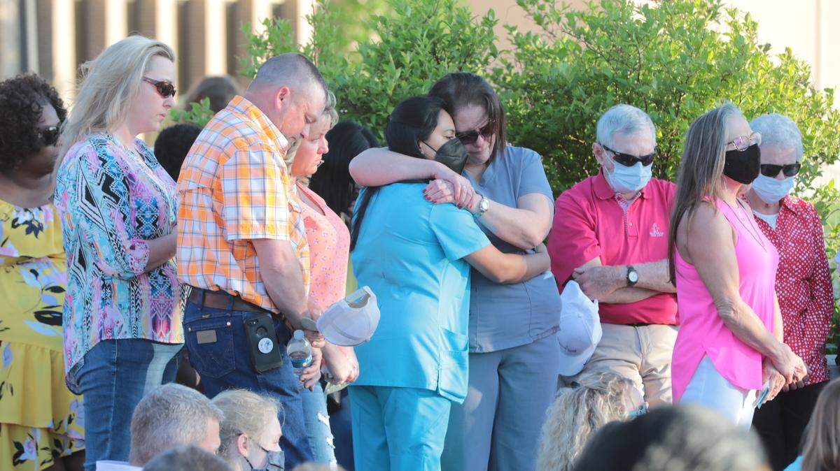 ‘We need to come together.’ Throngs at SC park mourn the 6 mass shooting victims