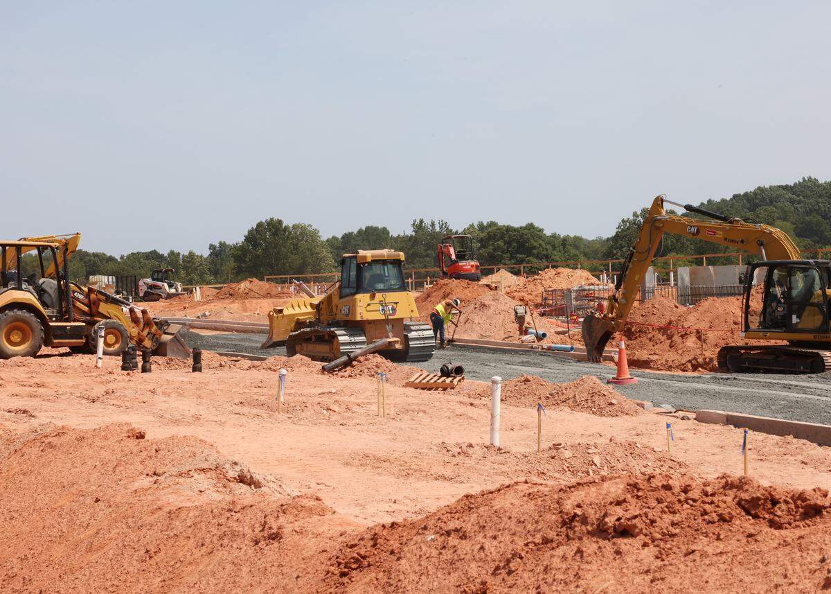 In this file photo, a construction crew works on the The Lodges at Indian Land on Fort Mill Highway. Lancaster County had the biggest growth in total population and in its Hispanic population.