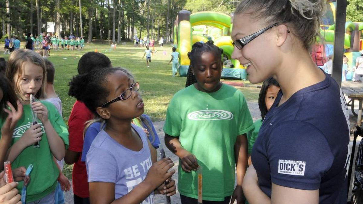 In this May 2016 file photo, Olympic wrestling hopeful Veronica Carlson talks to students at Richmond Drive Elementary in Rock Hill during their field day.