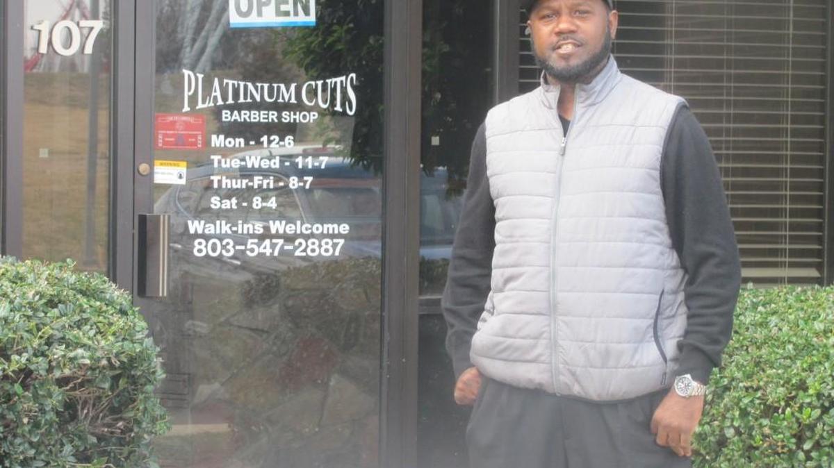 Owner Adrian “Ace” McCrorey at his Platinum Cuts barbershop in Fort Mill.