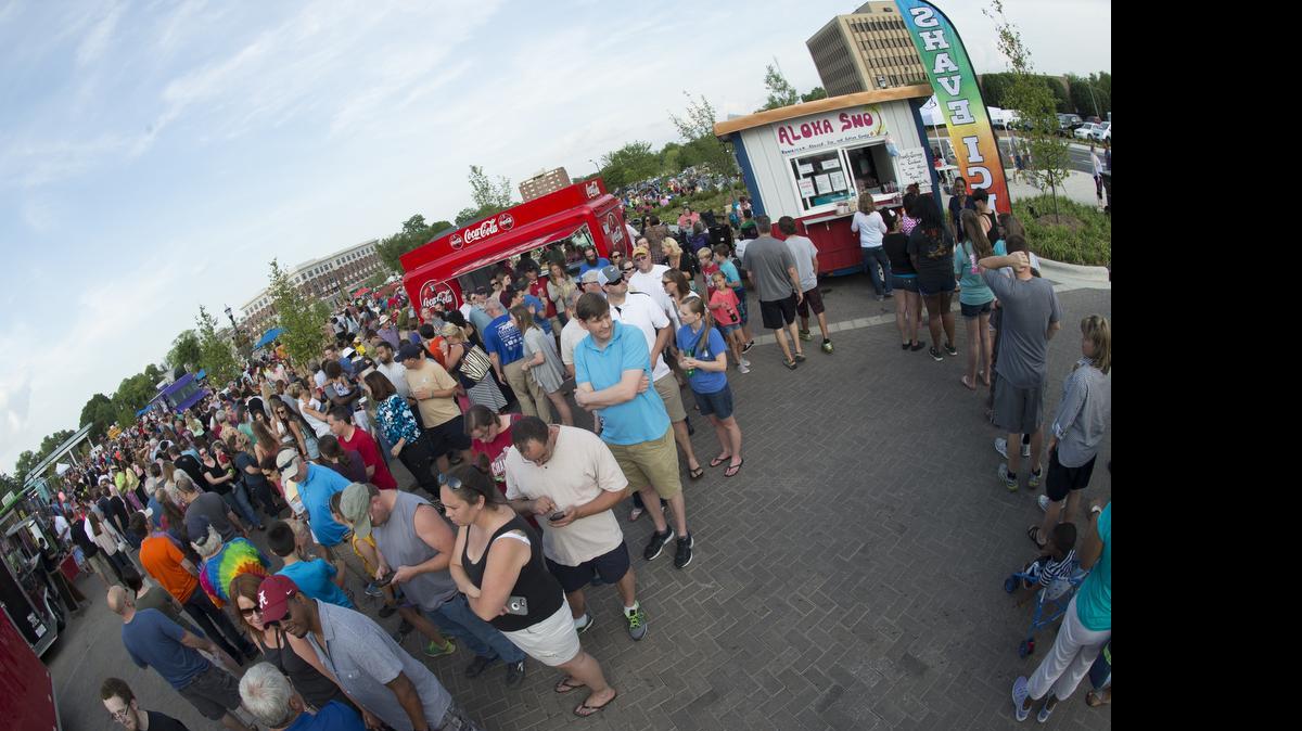 
A large crowd enjoys the first Food Truck Friday Night in Old Town Rock Hill.
