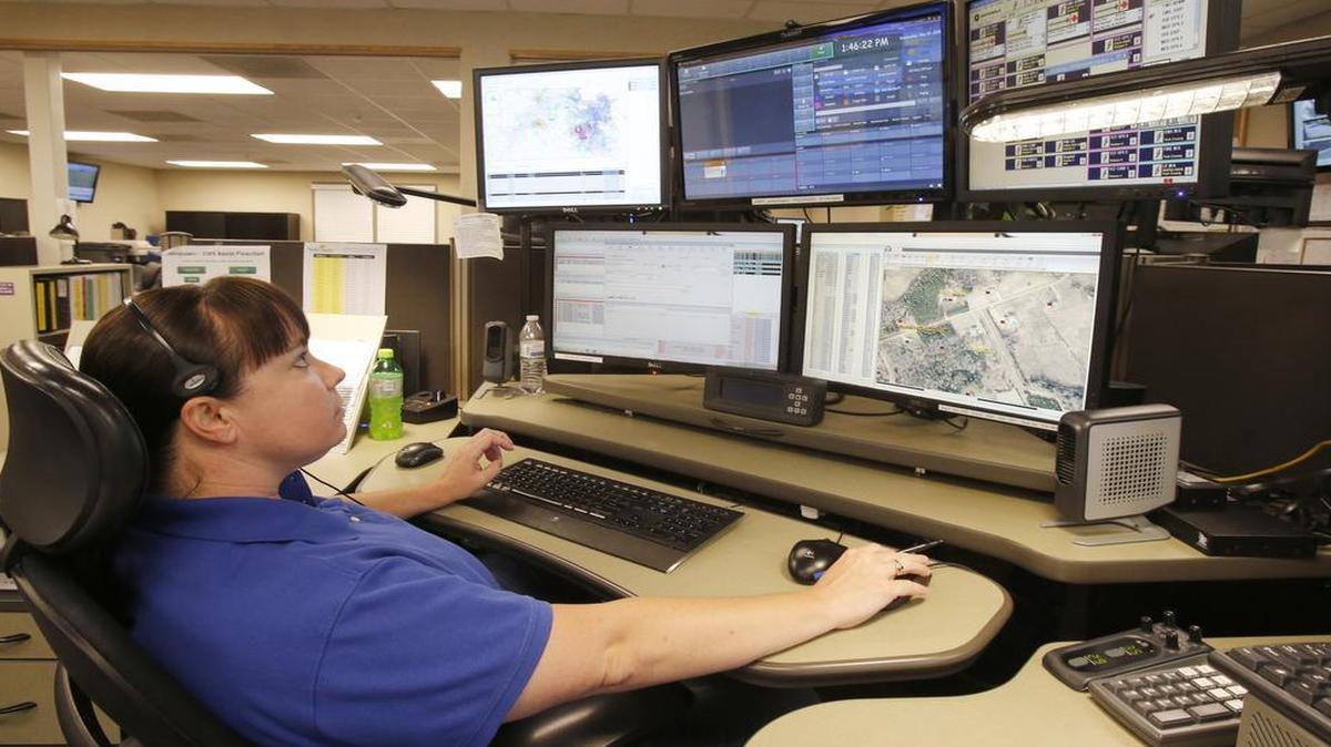 
Tracey Loss, assistant shift supervisor for York County 911, dispatches fire and EMS calls Wednesday in Rock Hill.
