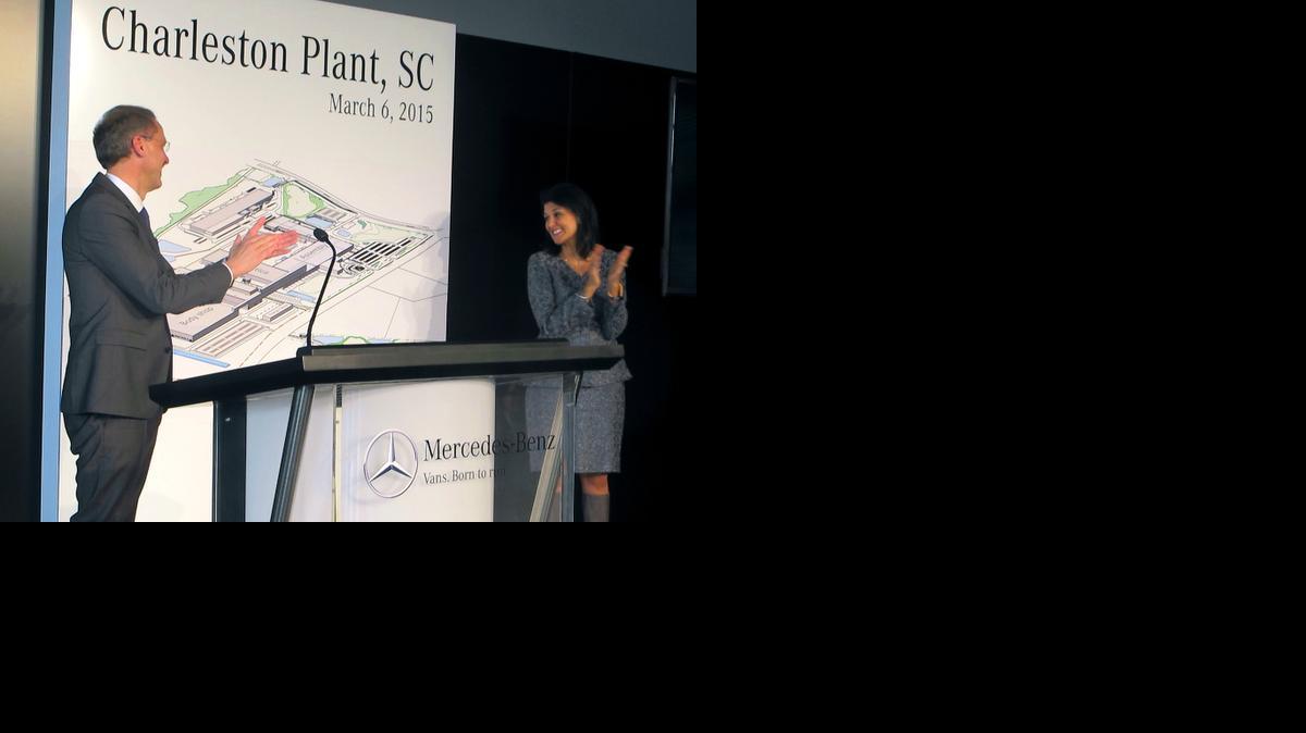 
Volker Mornhinweg, left, head of Mercedes-Benz Vans and Gov. Nikki Haley applaud the unveiling a drawing of a new van assembly plant. 
