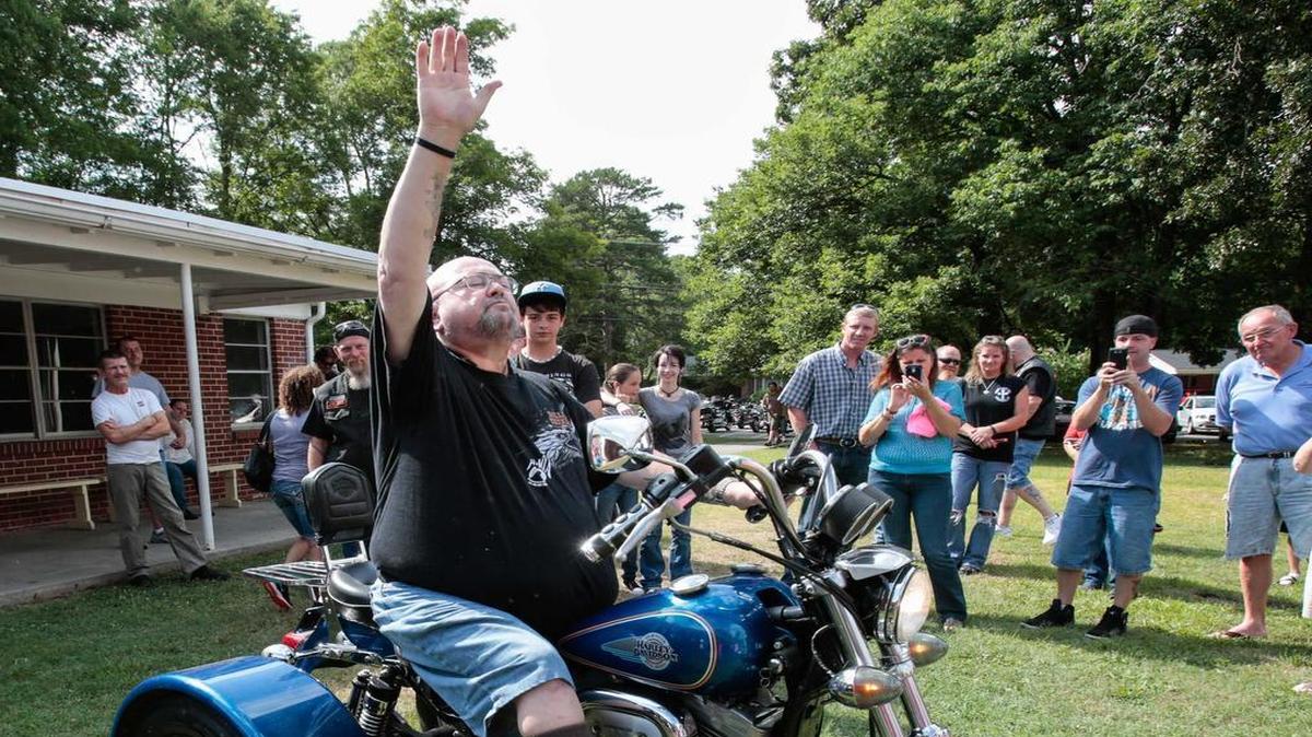 
RJ Lewis gives praise as Bikes for Blessings in conjunction with Faith Biker Church present him with a 1997 Harley Davidson 1200 Sportster trike at the Sylvia Circle Baptist Church in Rock Hill.
