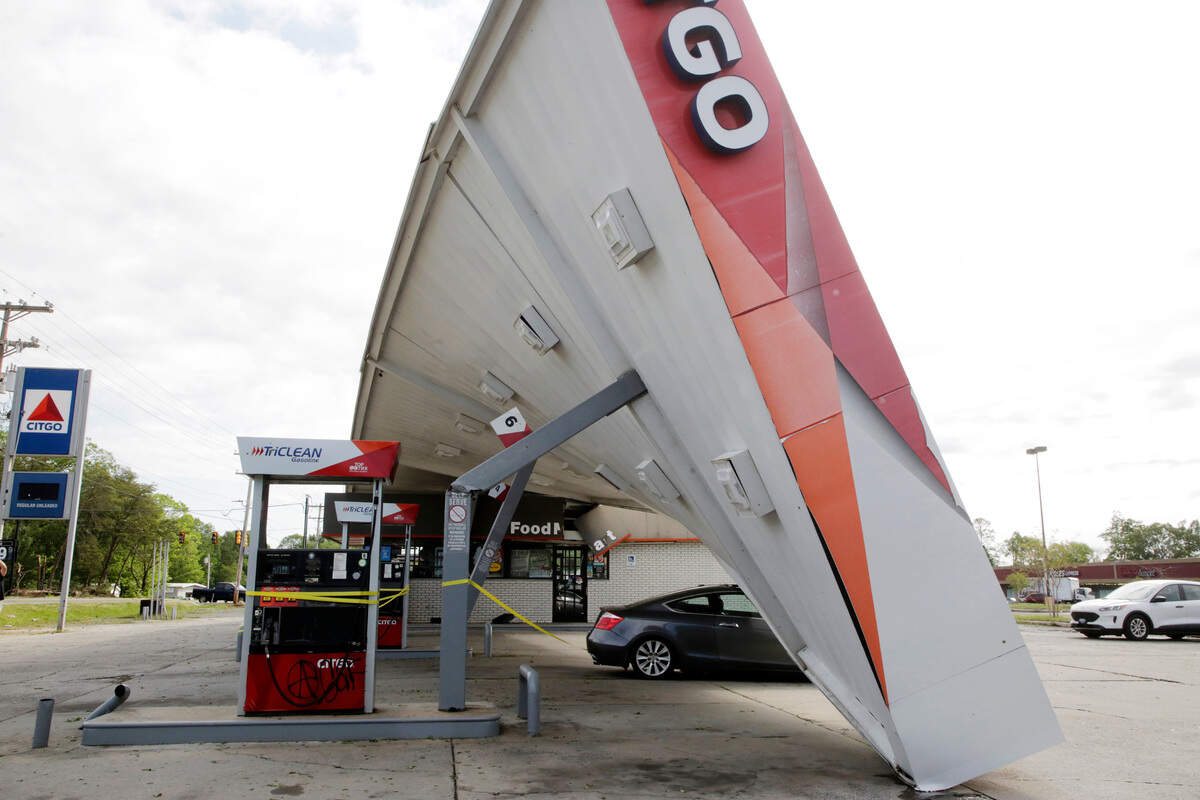 The awning of a Citgo convenience store toppled over on top of a car during Saturday’s hail storm on Albright Road in Rock Hill.