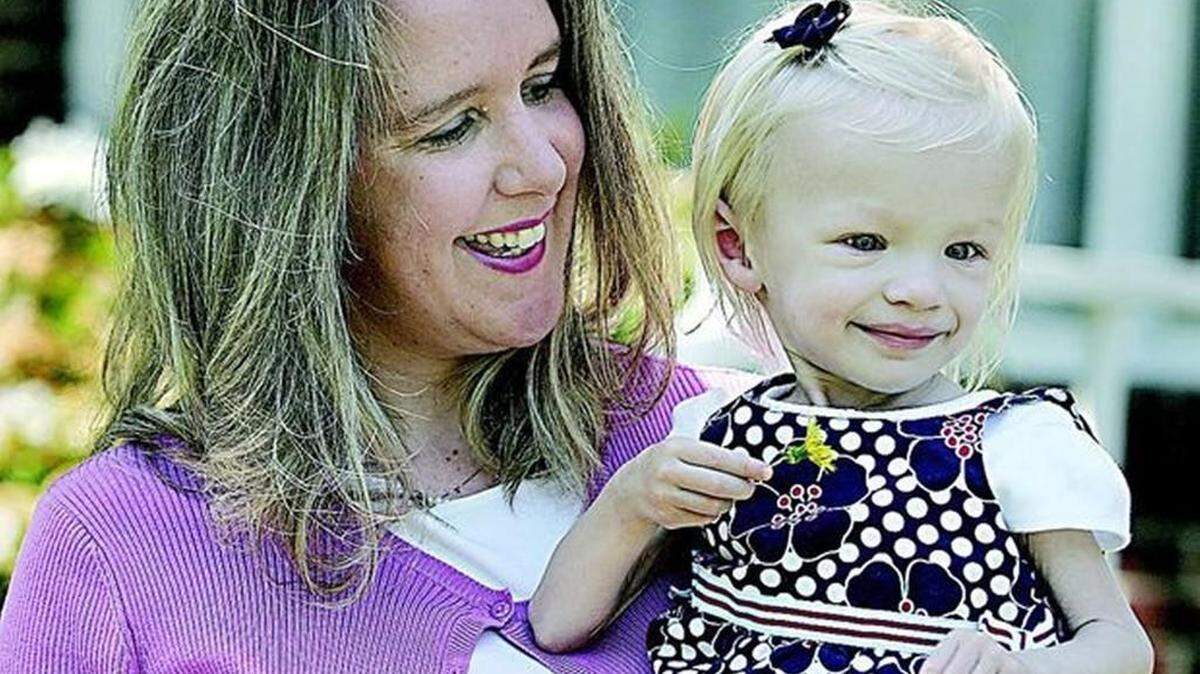 
Andrea Friddle holds her daughter, Riley, in April 2005. Riley was only 4 years old when she died of brain cancer.
