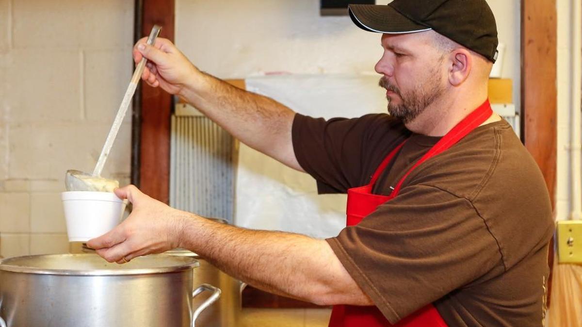 Brian Drawdy ladles potato soup at Bethel United Methodist Church’s soup kitchen, which opens Thursday.