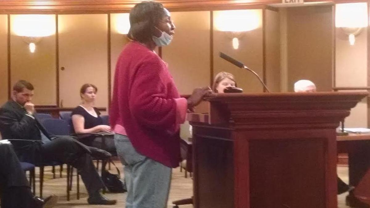 
Rock Hill resident Mary G. Dixon spoke at Monday’s City Council meeting in opposition to a planned increase in utility rates. Wearing a surgical mask, Dixon said she needs to power medical equipment and can’t afford to have her power turned off. The council later voted to approve a 5 percent increase in city electricity bills.
