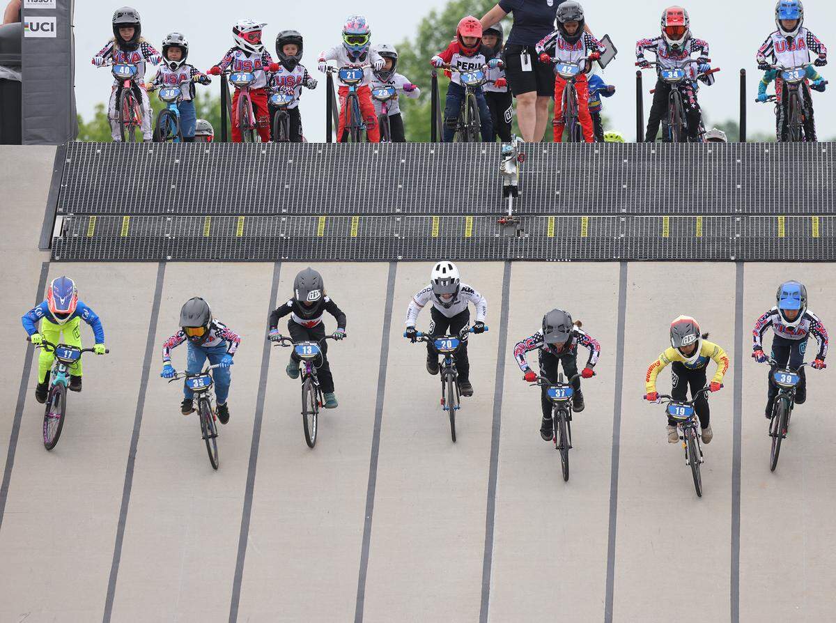 8-year-old Irelyn McGinley, bottom, second from left, flies down the starting hill Monday at the BMX World Championships in Rock Hill.