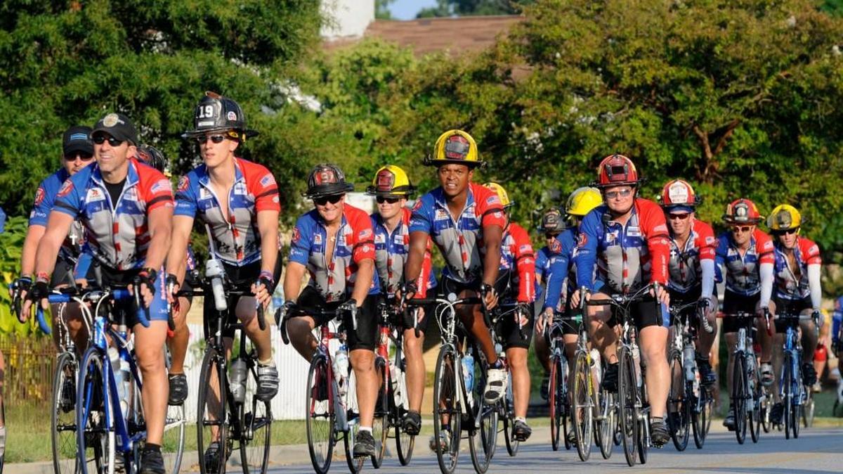 Cyclists ride down Main Street into Rock Hill for the 2011 9/11 Brotherhood Ride. The riders, who are honoring fallen firefighters, are making a 1,600-mile ride from Naples, Fla to New York City. They will complete the ride on September 10 in New York City.