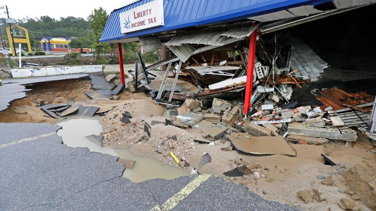 A business is destroyed by flooding near Gills Creek in Columbia.