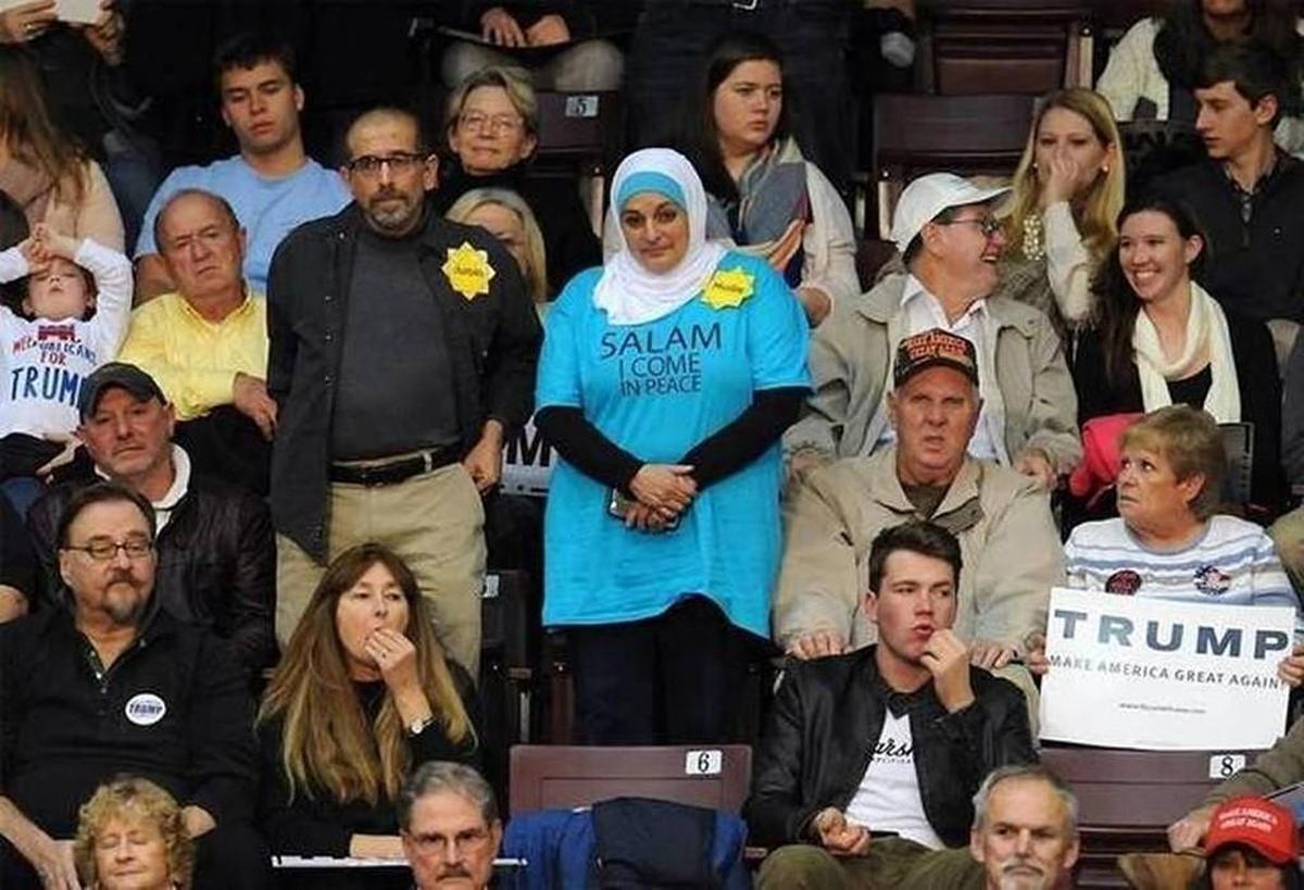 Rose Hamid stands in silent protest before being removed from a Donald Trump rally at the Winthrop Coliseum in January 2015.