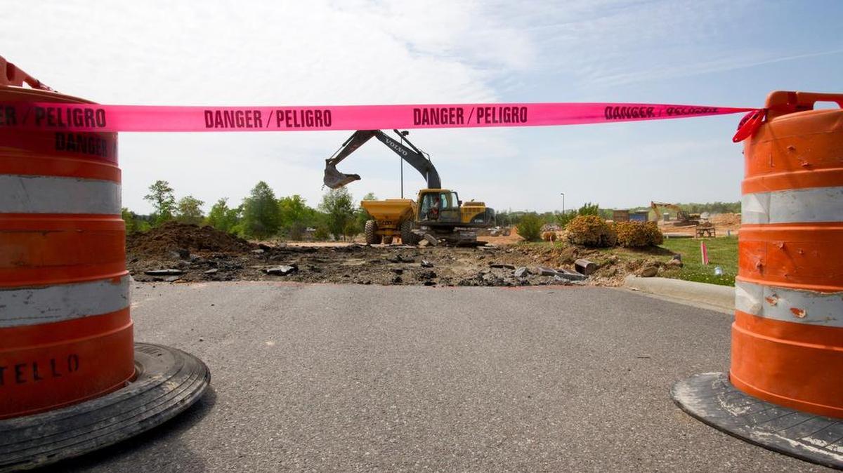 A parking lot near Walmart in Tega Cay is blocked to traffic Wednesday as road crews work on the Tega Cay Connector off S.C. 160.