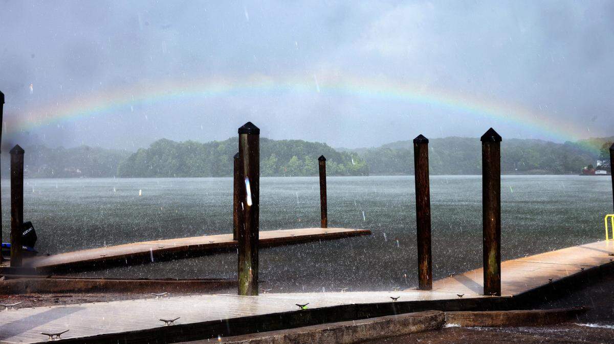 A rainbow forms over Lake Wylie near the Buster Boyd Bridge during a storm Tuesday.