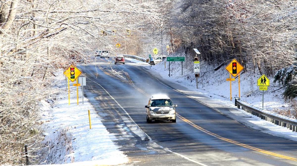 In this 2018 file photo, cars drive Thursday morning on melted snow and ice along U.S. 21 in Fort Mill.