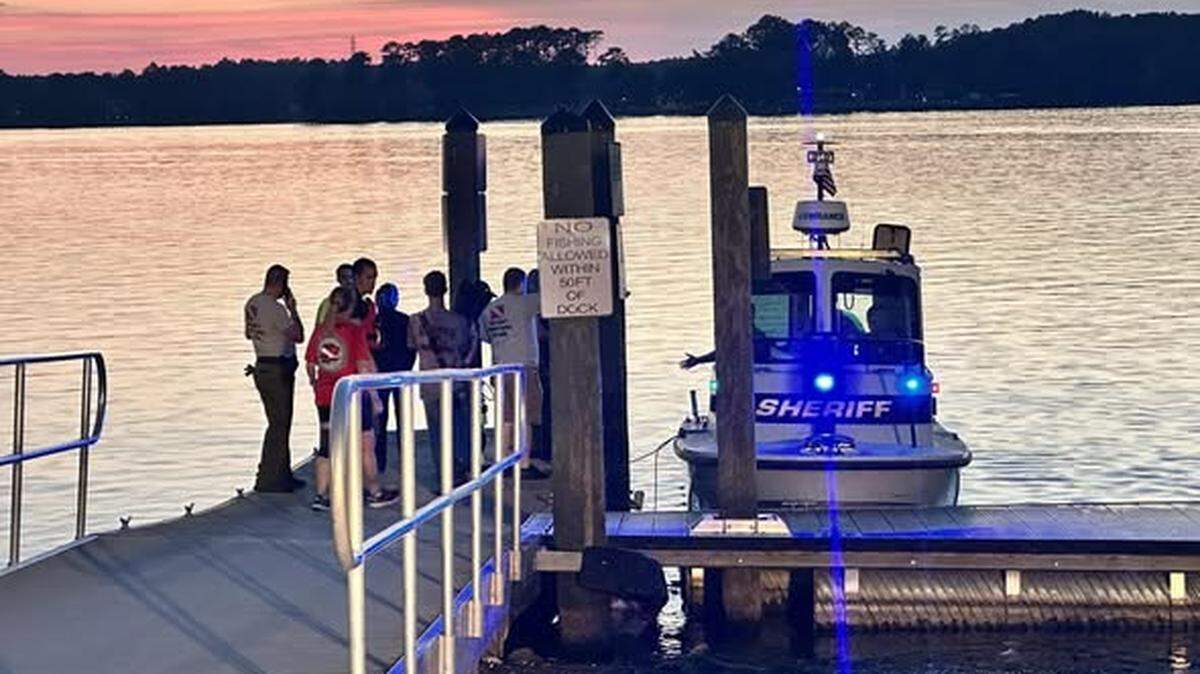 York County Sheriff’s Office deputies at Ebenezer Park boat landing on Monday during the search for a missing swimmer on Lake Wylie.