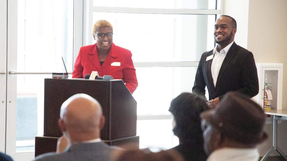 Seberina Myles, left, and William Stockdale speak to an audience at the Black Economic Leadership League Thursday in Rock Hill.