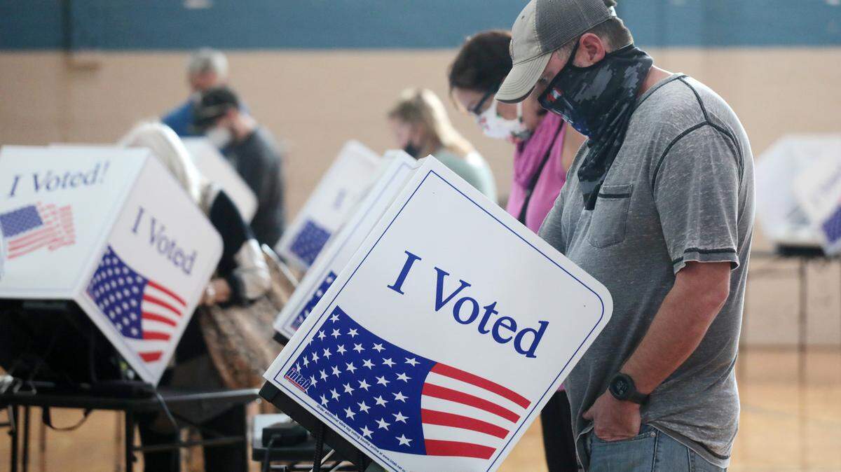 Voters cast their ballots Tuesday at the Fort Mill absentee voting site, located in the formerly known Banks Street Gym.