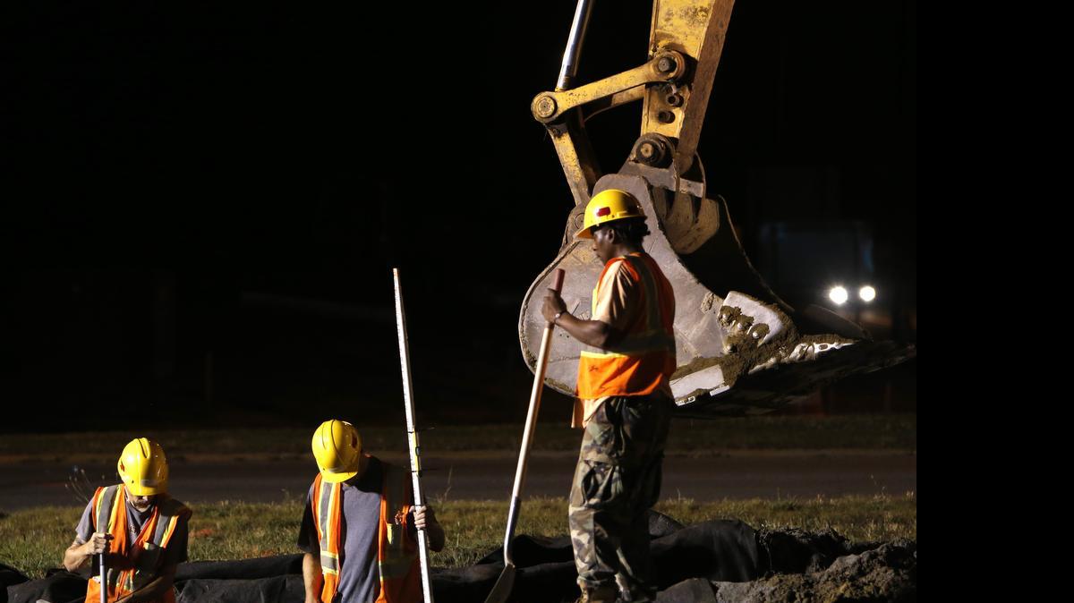 
Work is done at night on Dave Lyle Boulevard at Interstate 77 to to help drivers turn onto Chamberside Drive. 
