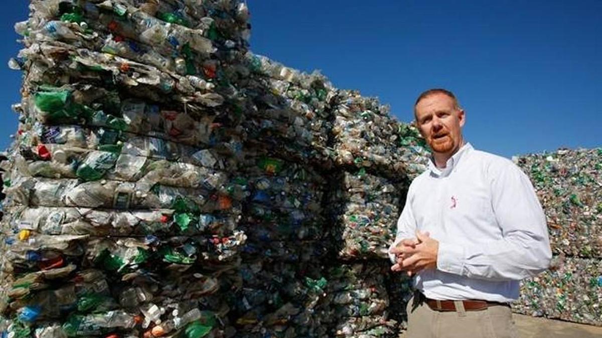 In this 2015 file photo, Eric Rekitt, York County Public Works director, stands next to bales of plastic soda bottles at the York County Public Works Recycling Center in York.