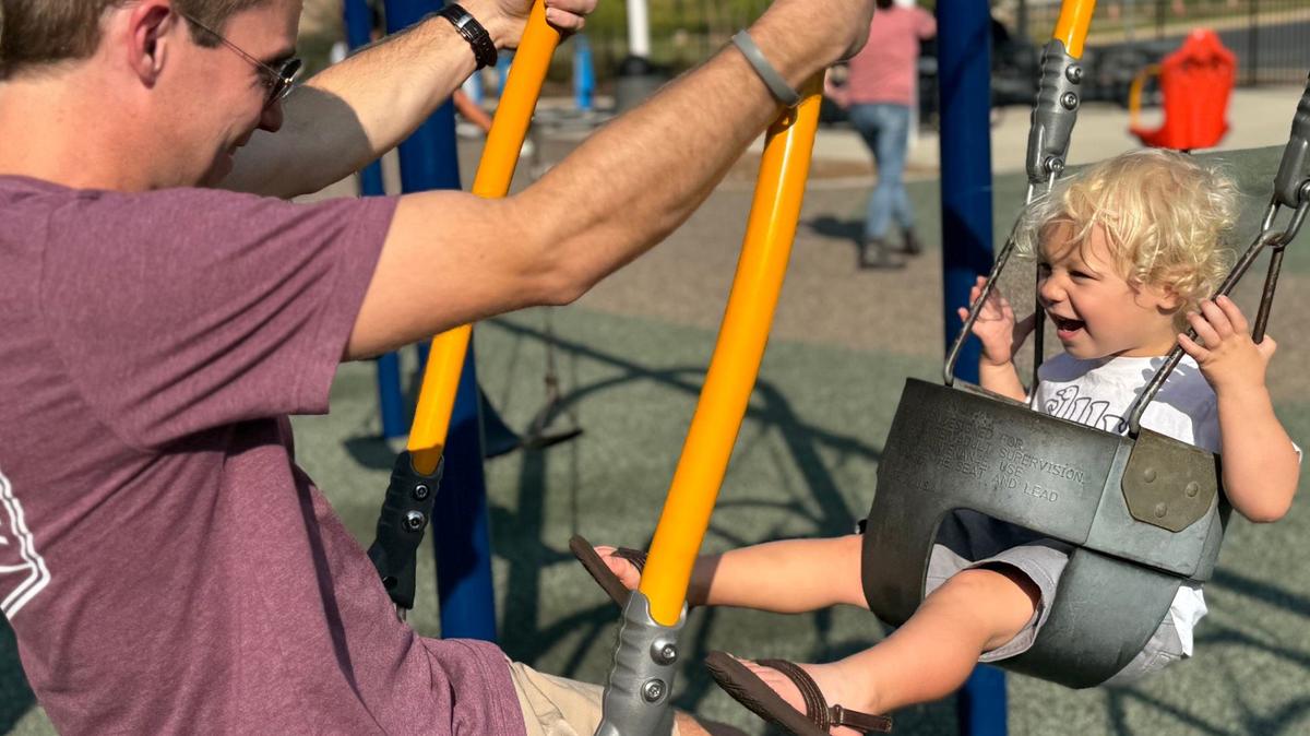 Marshall McGinnis, 2, and his dad Jonathan swing Tuesday at Miracle Park in Rock Hill. New fields and programming are coming to the park between Cherry Road and Eden Terrace, as park organizers look to raise $1.5 million to pay for it.