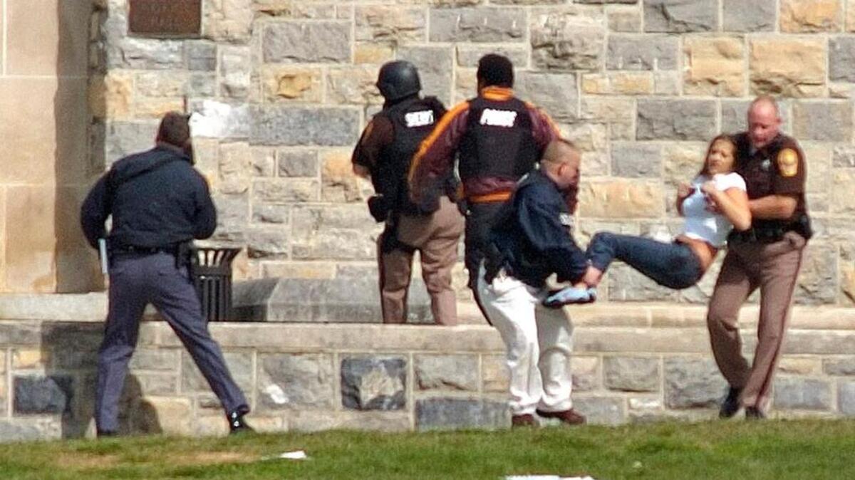 On April 16, 2007, an injured student is carried out of Norris Hall at Virginia Tech in Blacksburg, Va. A student armed with two guns and hundreds of rounds of ammunition gunned down 32 people on campus that day, most of them in Norris Hall.
