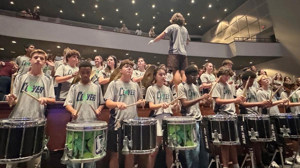 The Clover High School band practices in the school auditorium. The Blue Eagles band will perform at the 137th Rose Bowl Parade in Pasadena, Ca,