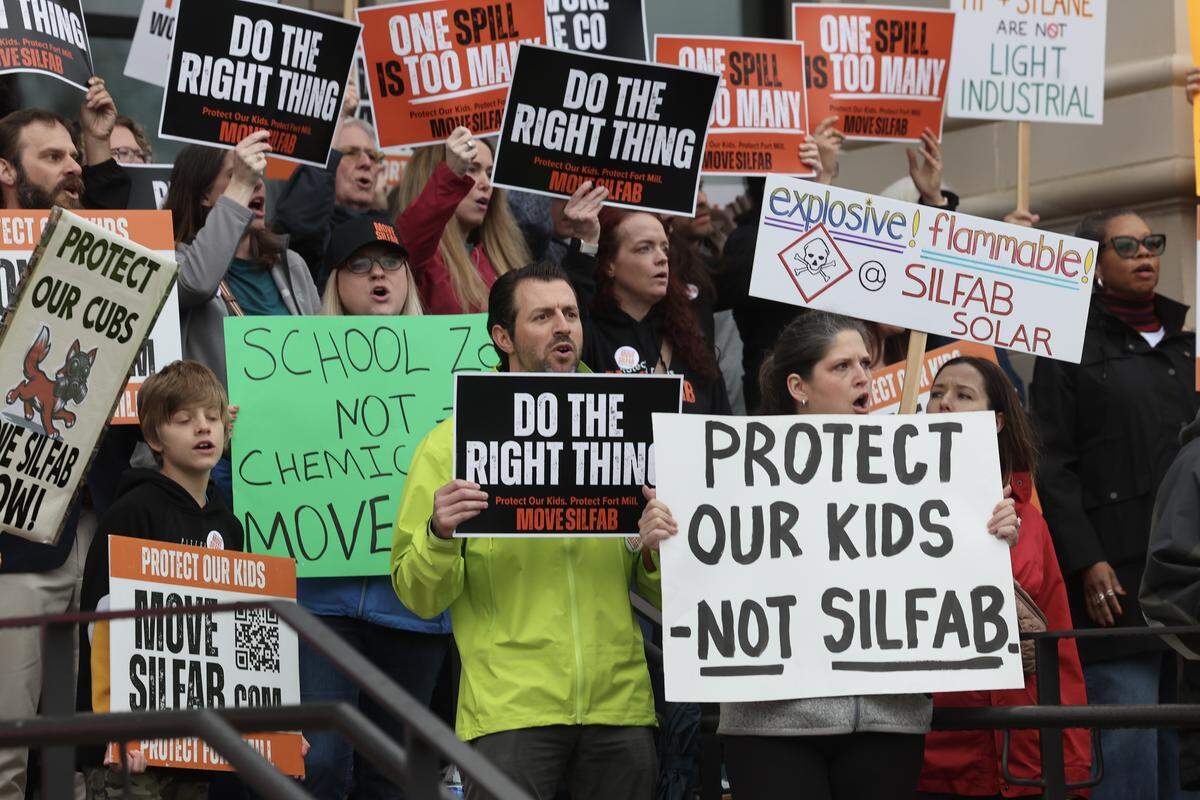 Protesters chant at the York County Council meeting in York, S.C. on Monday, March 16, 2026. The protesters were demanding the county council revoke Silfab Solar's certificate of occupancy. The Fort Mill-based company had two chemical incidents earlier in March that caused public outcry.