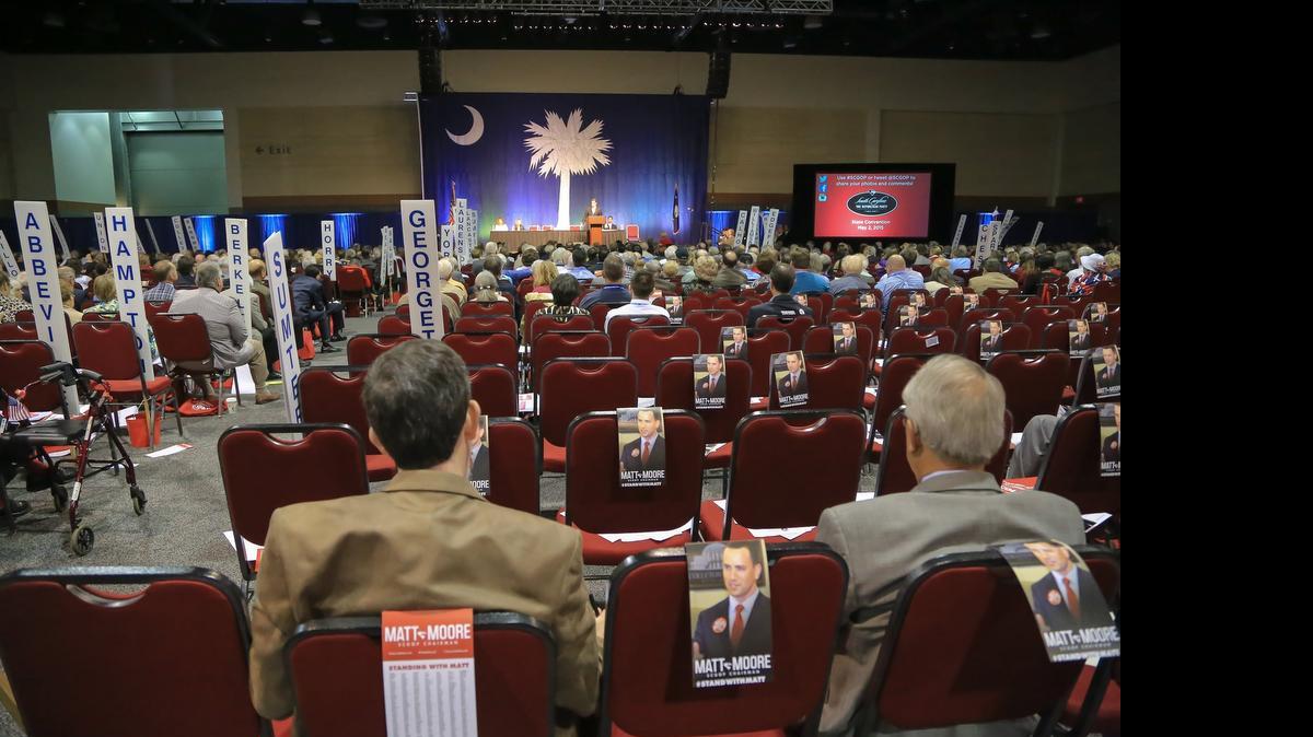 
Members of the South Carolina Republican Part listen to former Texas Governor Rick Perry Saturday at the Columbia Metropolitan Convention Center. 
