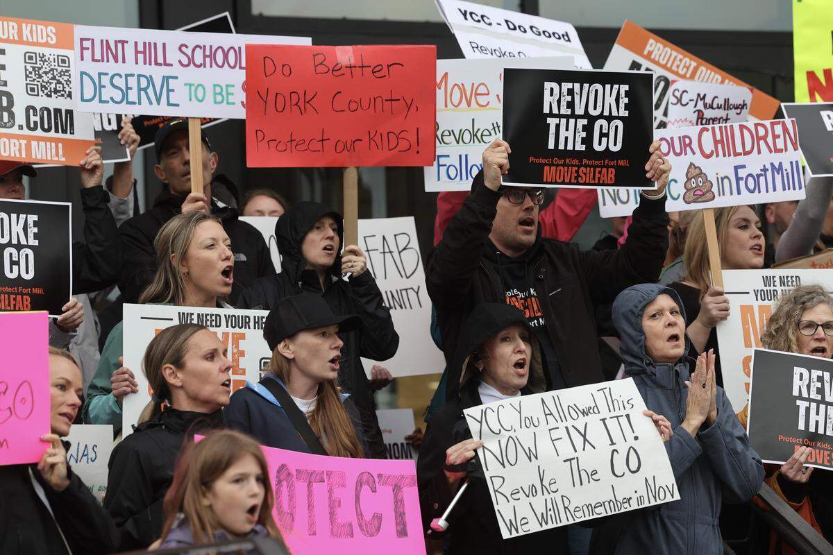 Protesters chant at the York County Council meeting in York, S.C. on Monday, March 16, 2026. The protesters were demanding the county council revoke Silfab Solar's certificate of occupancy. The Fort Mill-based company had two chemical incidents earlier in March that caused public outcry.