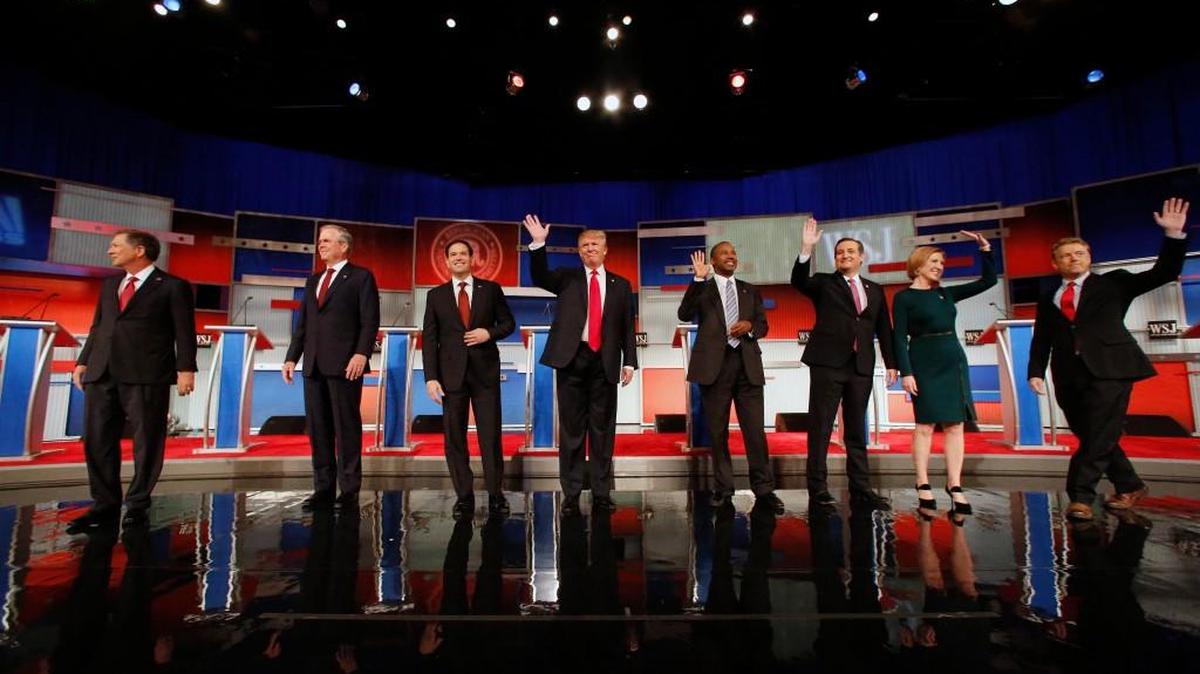 Republican presidential candidates John Kasich, Jeb Bush, Marco Rubio, Donald Trump, Ben Carson, Ted Cruz, Carly Fiorina and Rand Paul take the stage before the Republican presidential debate Tuesday.