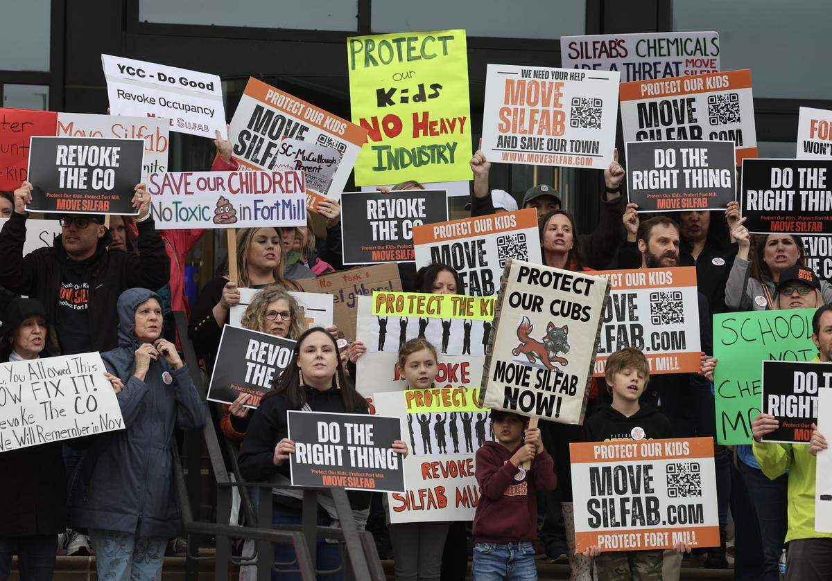 Protesters chant at the York County Council meeting in York, S.C. on Monday, March 16, 2026. The protesters were demanding the county council revoke Silfab Solar's certificate of occupancy. The Fort Mill-based company had two chemical incidents earlier in March that caused public outcry.