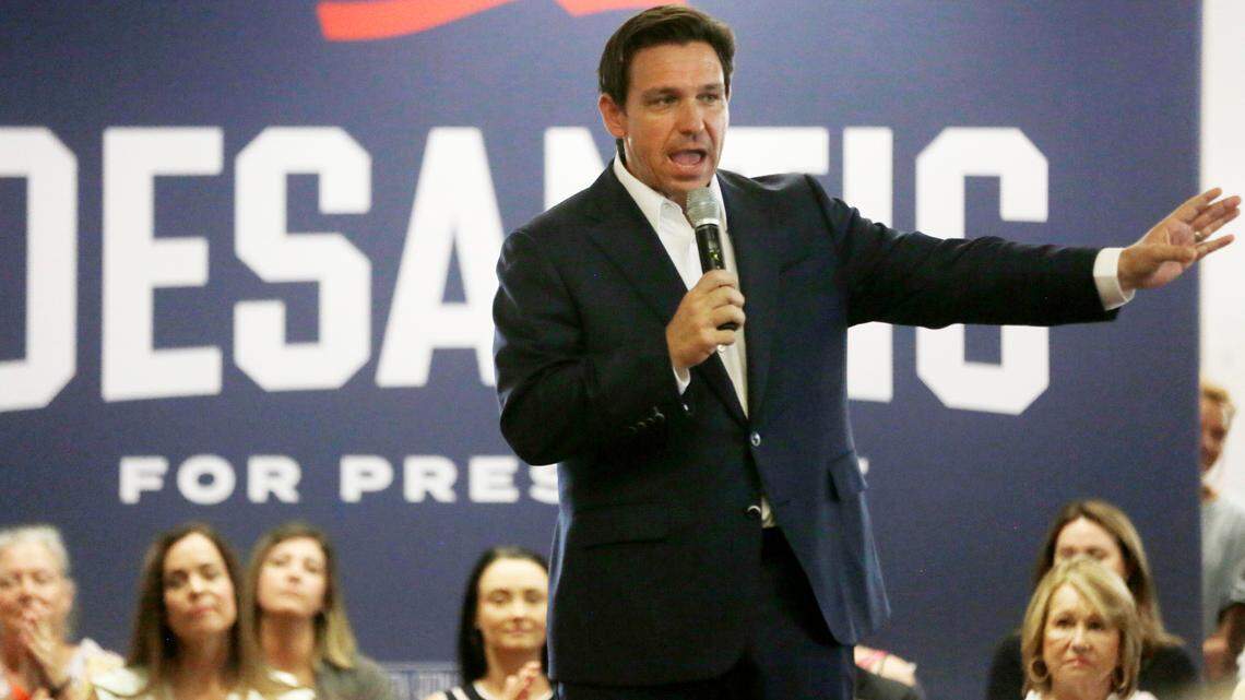 Florida governor, and U.S. presidential hopeful, Ron DeSantis talks to a crowd Monday in Tega Cay, S.C.