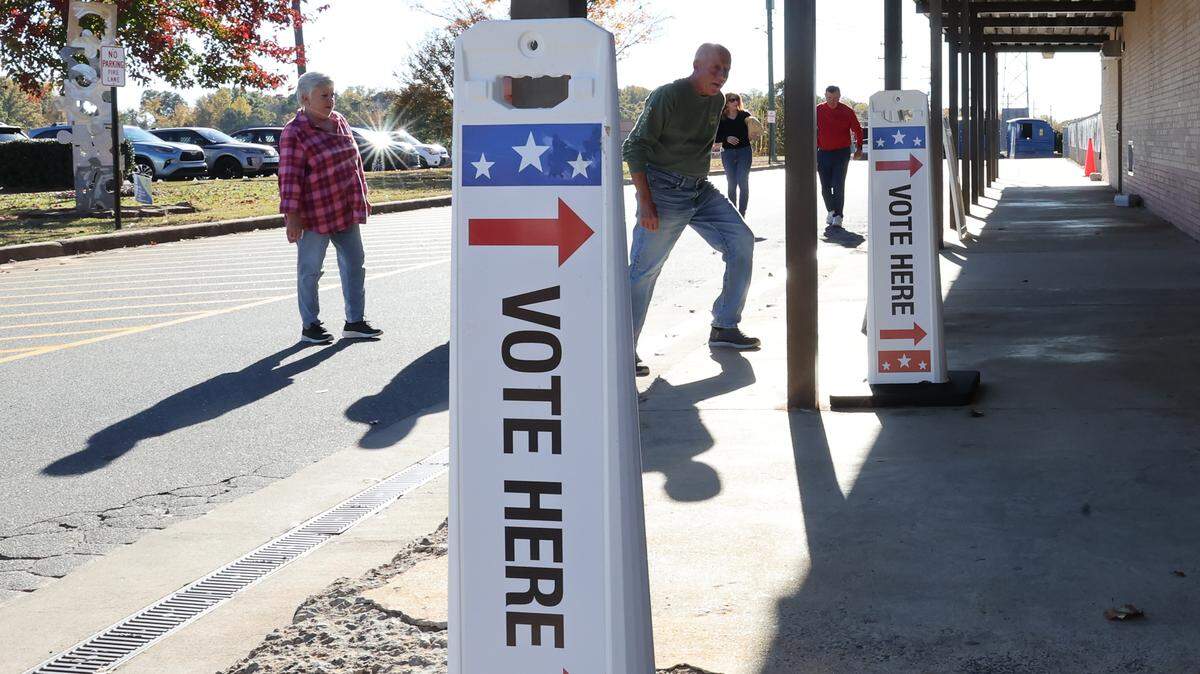A group of voters head to the polls Tuesday, Nov. 4, 2025 at Indian Land Intermediate School in Lancaster County, S.C.