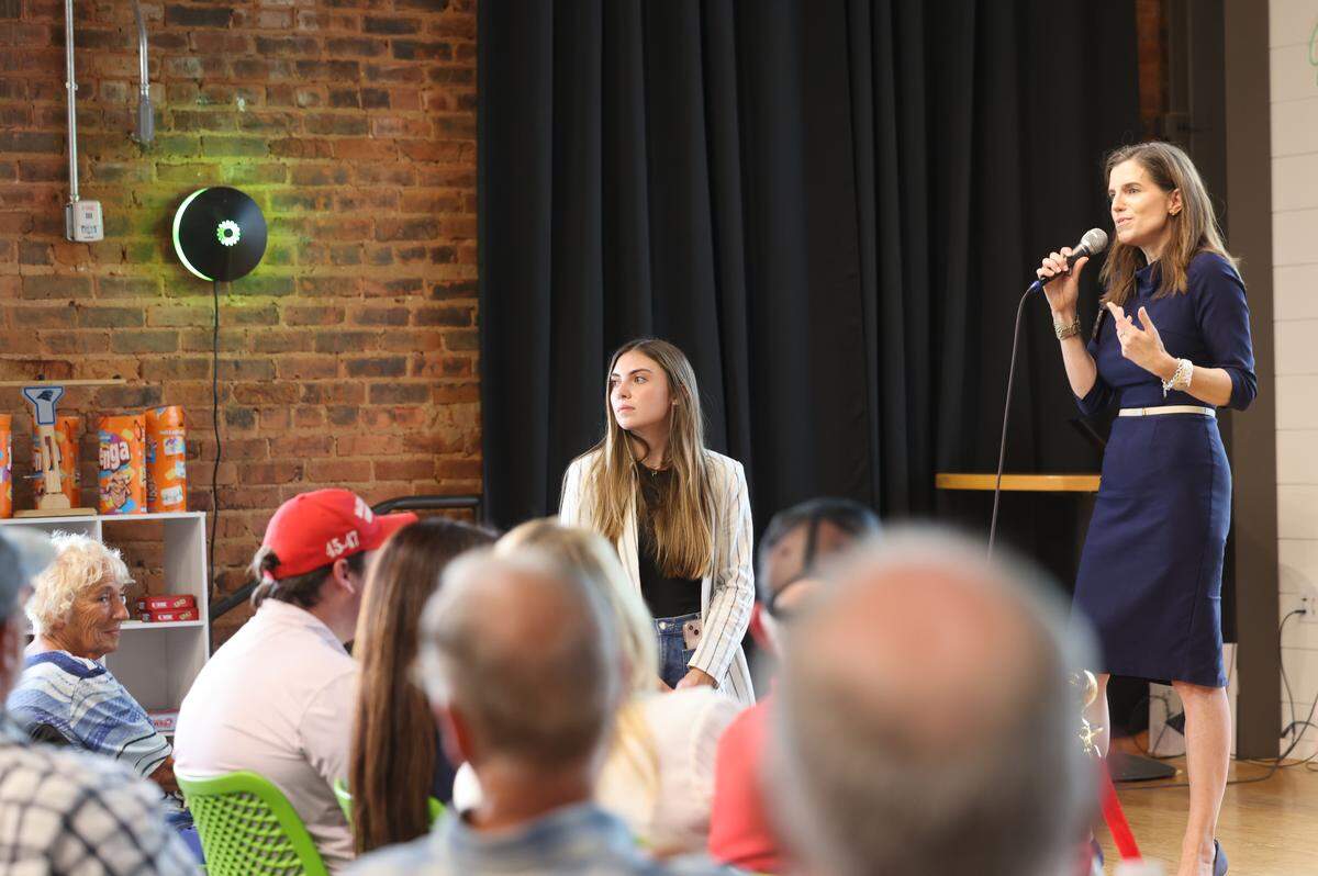 Republican candidate for South Carolina governor, Nancy Mace, talks to a crowd at Hoppin' in Rock Hill Monday.
