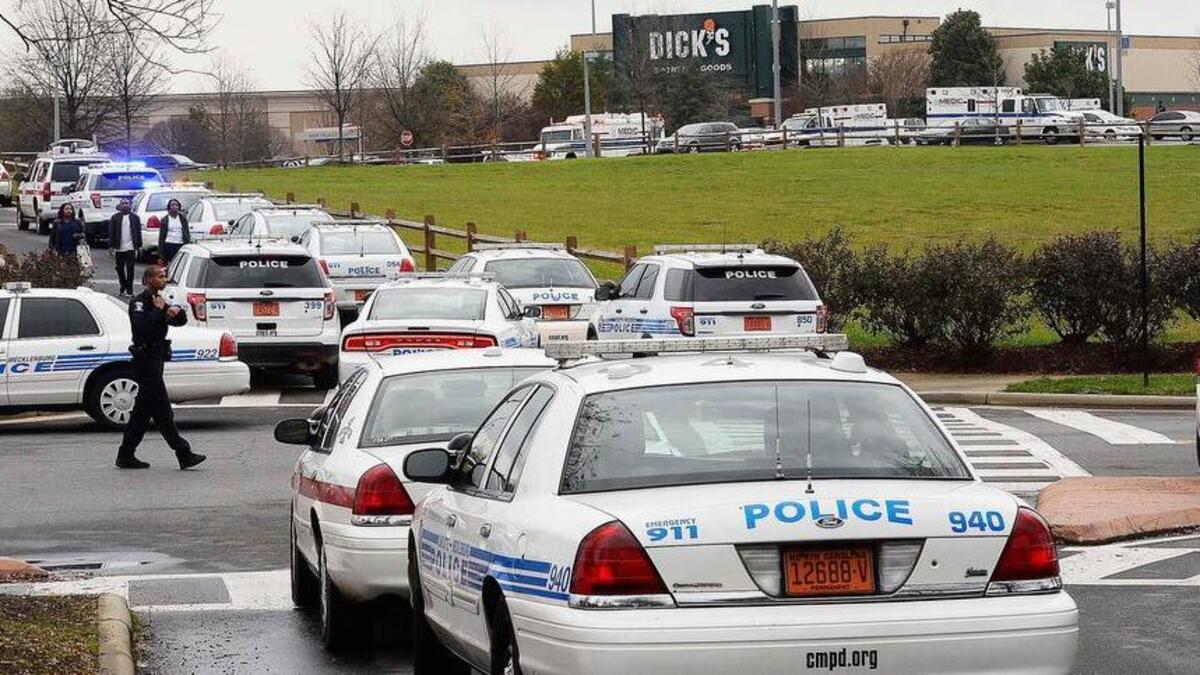 Police on the scene at Northlake Mall where a fatal shooting took place, causing the mall to be evacuated on Dec. 24,2015