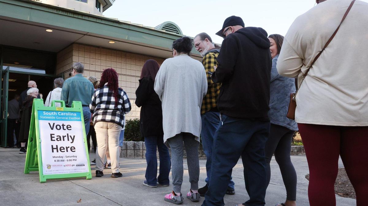 Voters wanting to cast their vote early line up at Baxter Hood Center in Rock Hill, S.C. Monday, Oct. 21, 2024.
