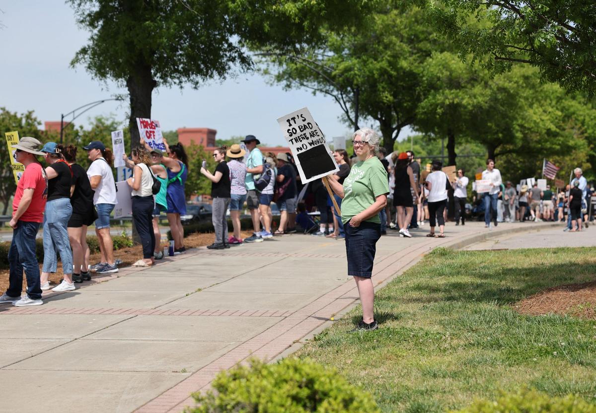 Hundreds of demonstrators gather in downtown Rock Hill Saturday for the York County Rising protest.